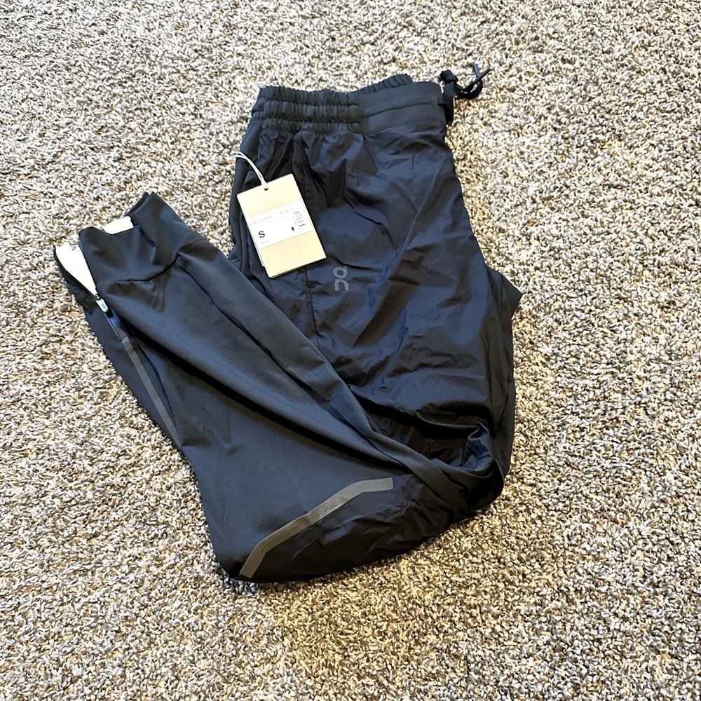 On running Men’s small black running pants brand new with tags